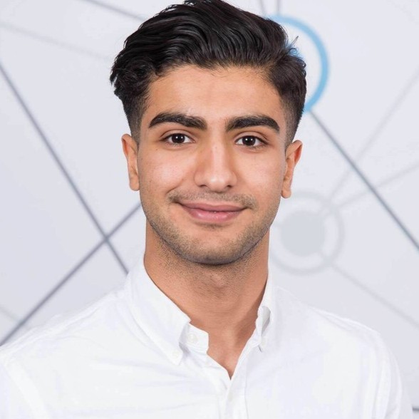 Sharif headshot loading=